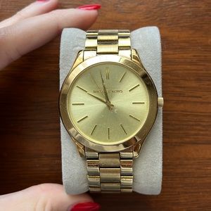 Womens Michael kors gold watch